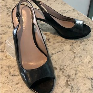 Nine West black leather peep toe sling back